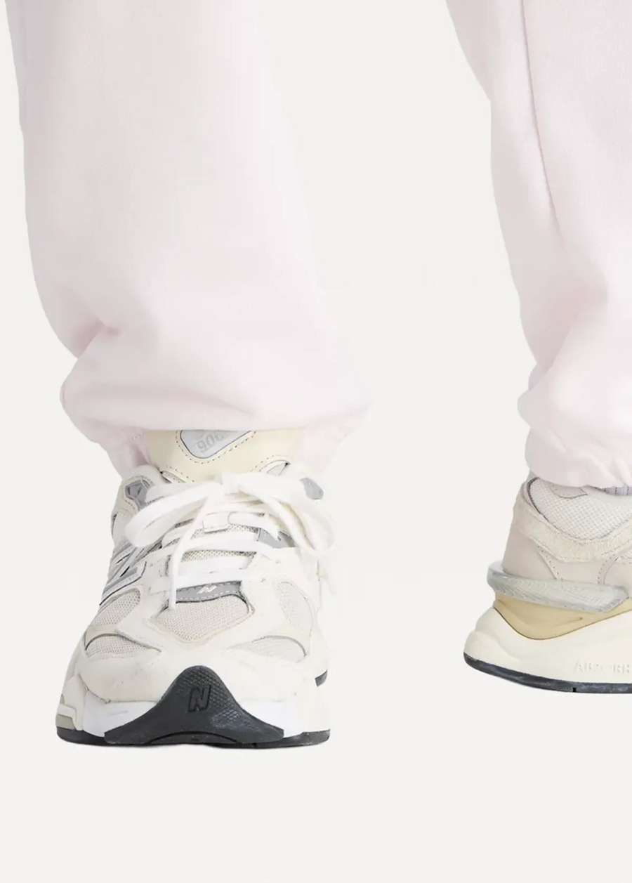 Штани жіночі New Balance Sport Essentials French Terry Jogger світло-рожевого кольору
