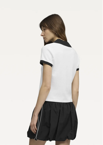 Поло жіноче PUMA WARDROBE ESS Polo білого кольору
