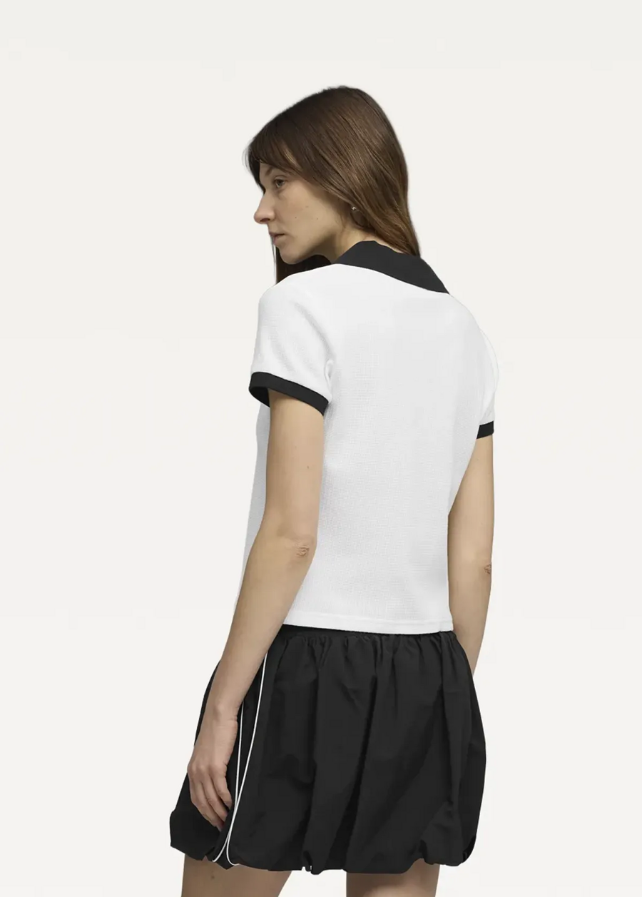 Поло жіноче PUMA WARDROBE ESS Polo білого кольору