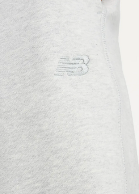 Спортивні штани жіночі New Balance Athletics French Terry світло-сірого кольору