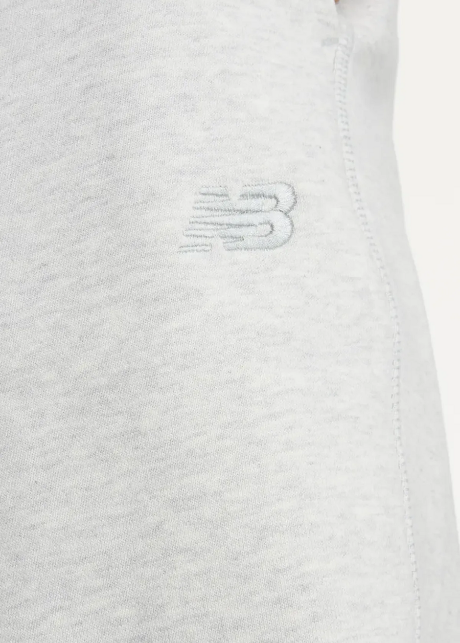 Спортивні штани жіночі New Balance Athletics French Terry світло-сірого кольору