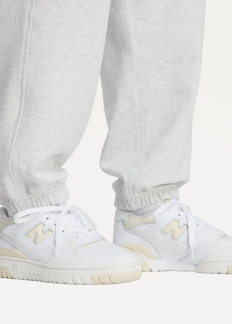 Спортивні штани жіночі New Balance Athletics French Terry світло-сірого кольору