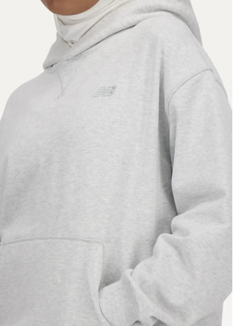 Худі жіноче New Balance Athletics French Terry світло-сірого кольору