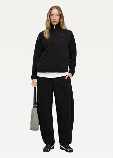 Спортивні штани жіночі PUMA HER Relaxed Winterized Pants чорного кольору