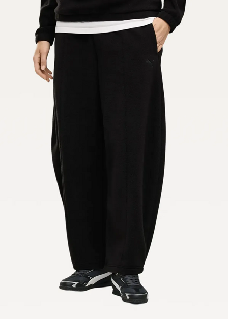 Спортивні штани жіночі PUMA HER Relaxed Winterized Pants чорного кольору