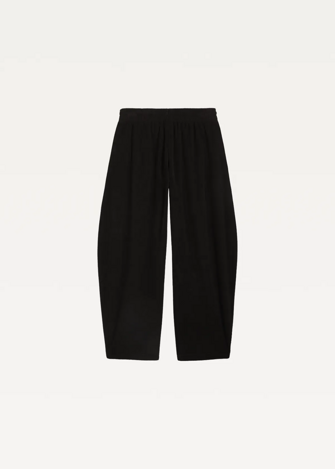 Спортивні штани жіночі PUMA HER Relaxed Winterized Pants чорного кольору