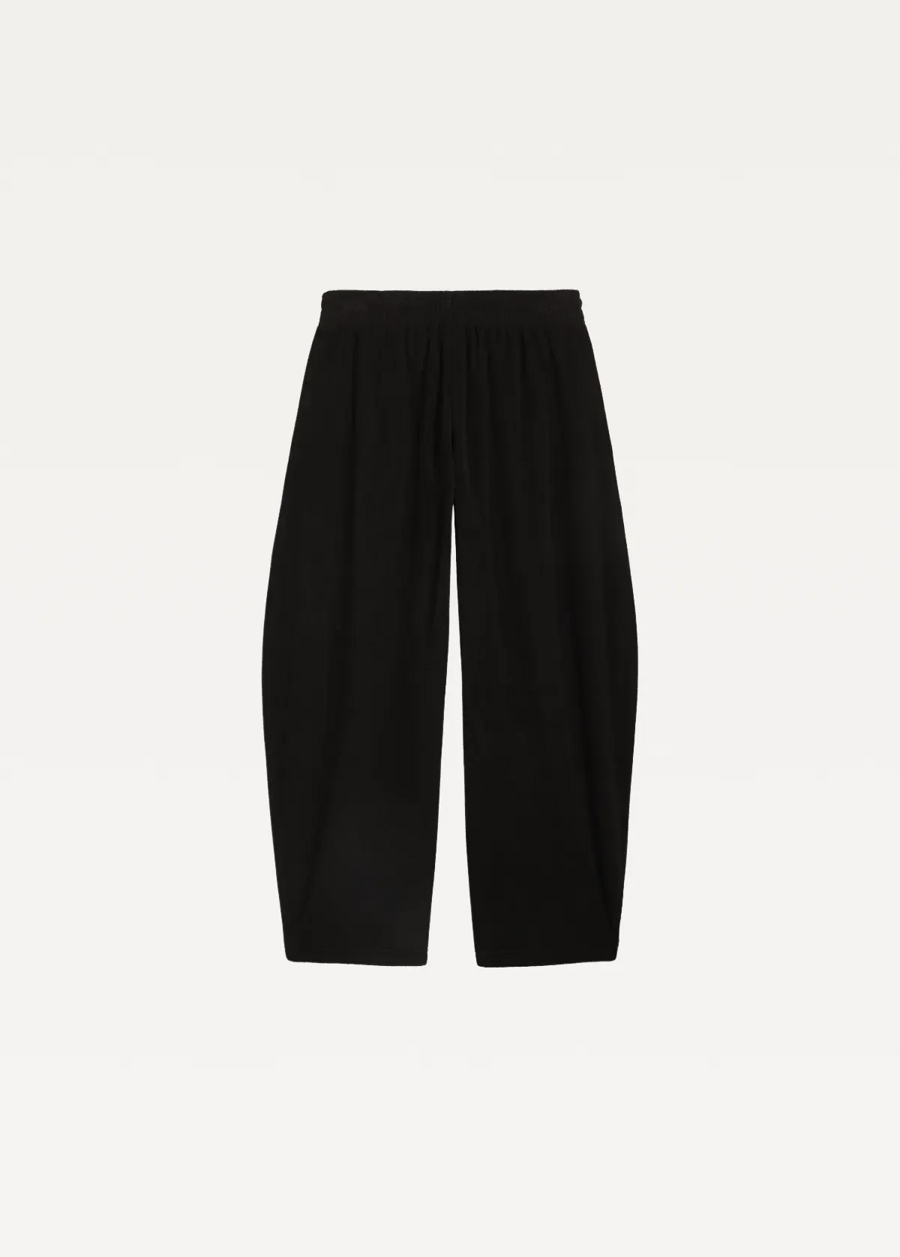 Спортивні штани жіночі PUMA HER Relaxed Winterized Pants чорного кольору