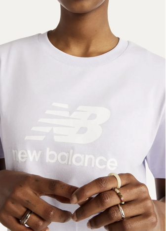 Футболка жіноча New Balance Sport Essentials Jersey Logo бузкового кольору