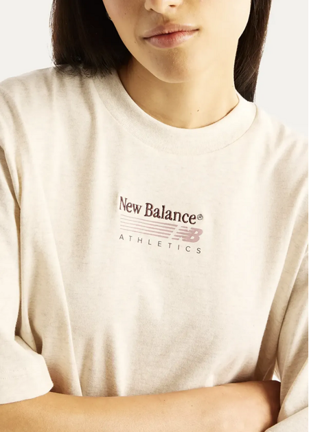 Футболка жіноча New Balance Trackside молочного кольору