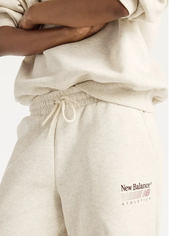 Штани жіночі New Balance Trackside Fleece бежевого кольору