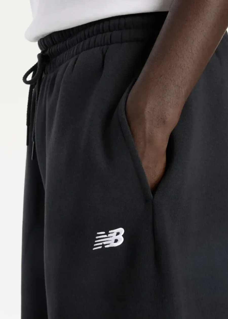 Штани чоловічі New Balance Essentials Fleece чорного кольору