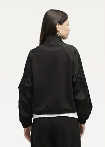Ветровка женская PUMA HER Full-Zip Relaxed Jacket черного цвета