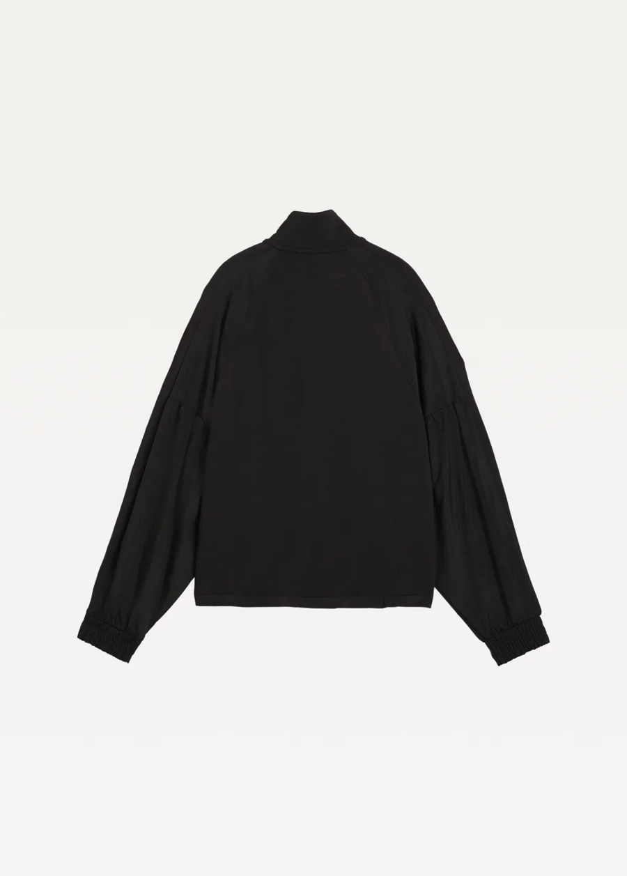 Ветровка женская PUMA HER Full-Zip Relaxed Jacket черного цвета