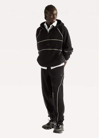 Штани чоловічі New Balance Trackside Polar Fleece чорного кольору