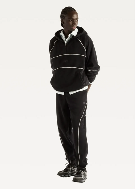 Штани чоловічі New Balance Trackside Polar Fleece чорного кольору