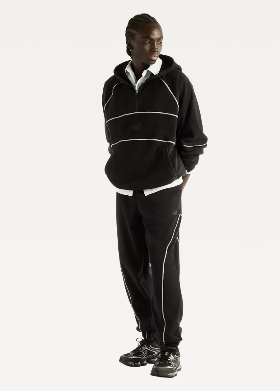 Штани чоловічі New Balance Trackside Polar Fleece чорного кольору
