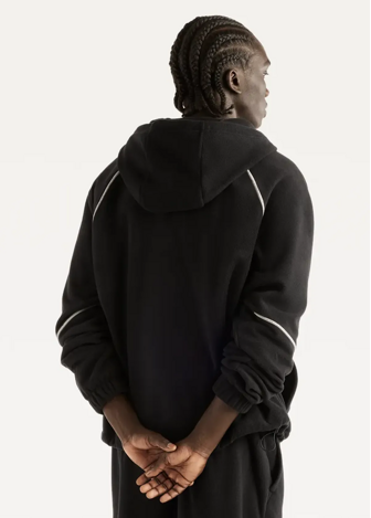 Свитшот мужской New Balance Trackside Polar Fleece черного цвета