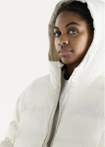 Куртка-пуховик жіноча New Balance Boston Puffer молочного кольору