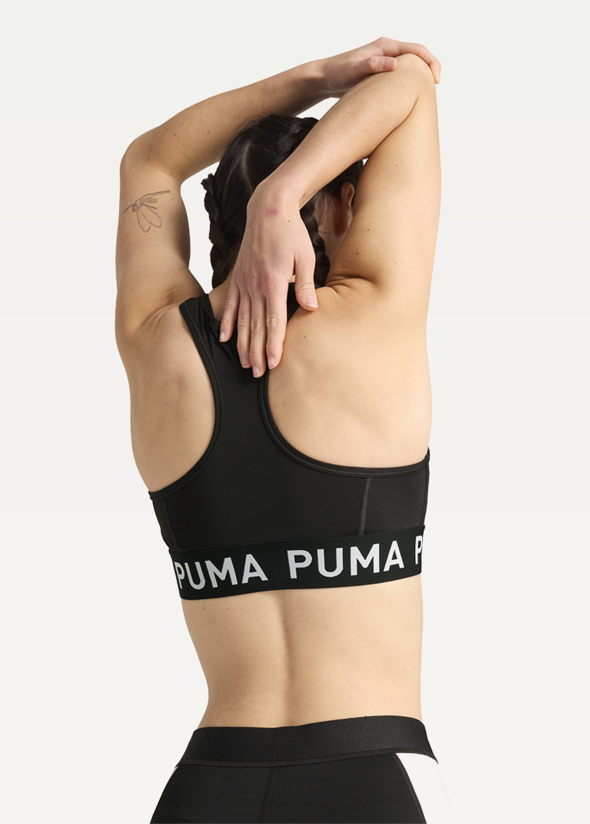 Топ PUMA 4KEEPS ELASTIC BRA - P чорного кольору