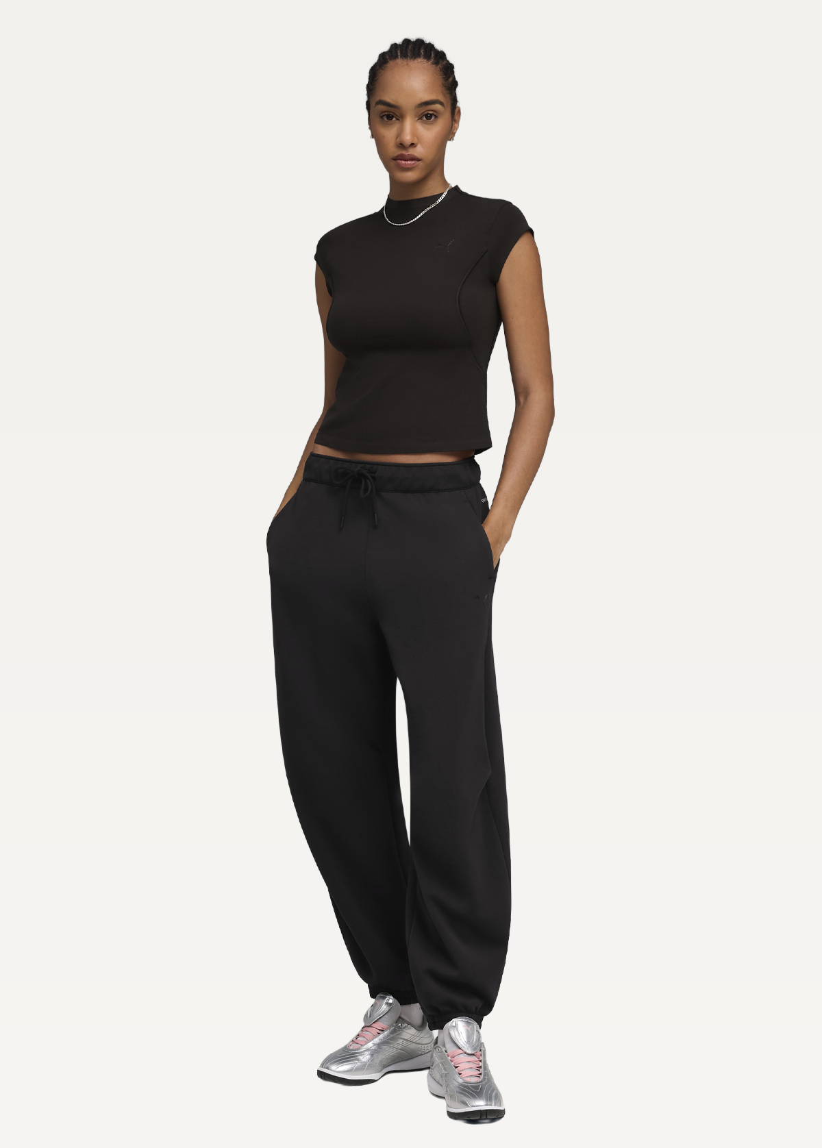 Спортивні штани жіночі PUMA PUMATECH SENSE Pants DK cl чорного кольору