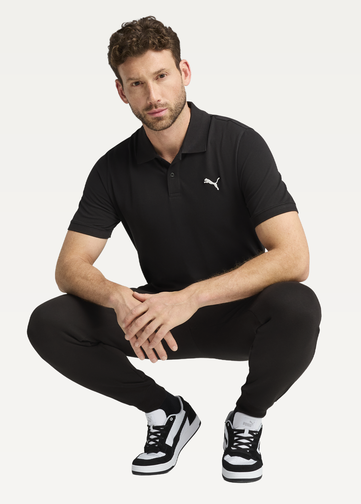 Поло мужское PUMA ESS Pique Polo черного цвета