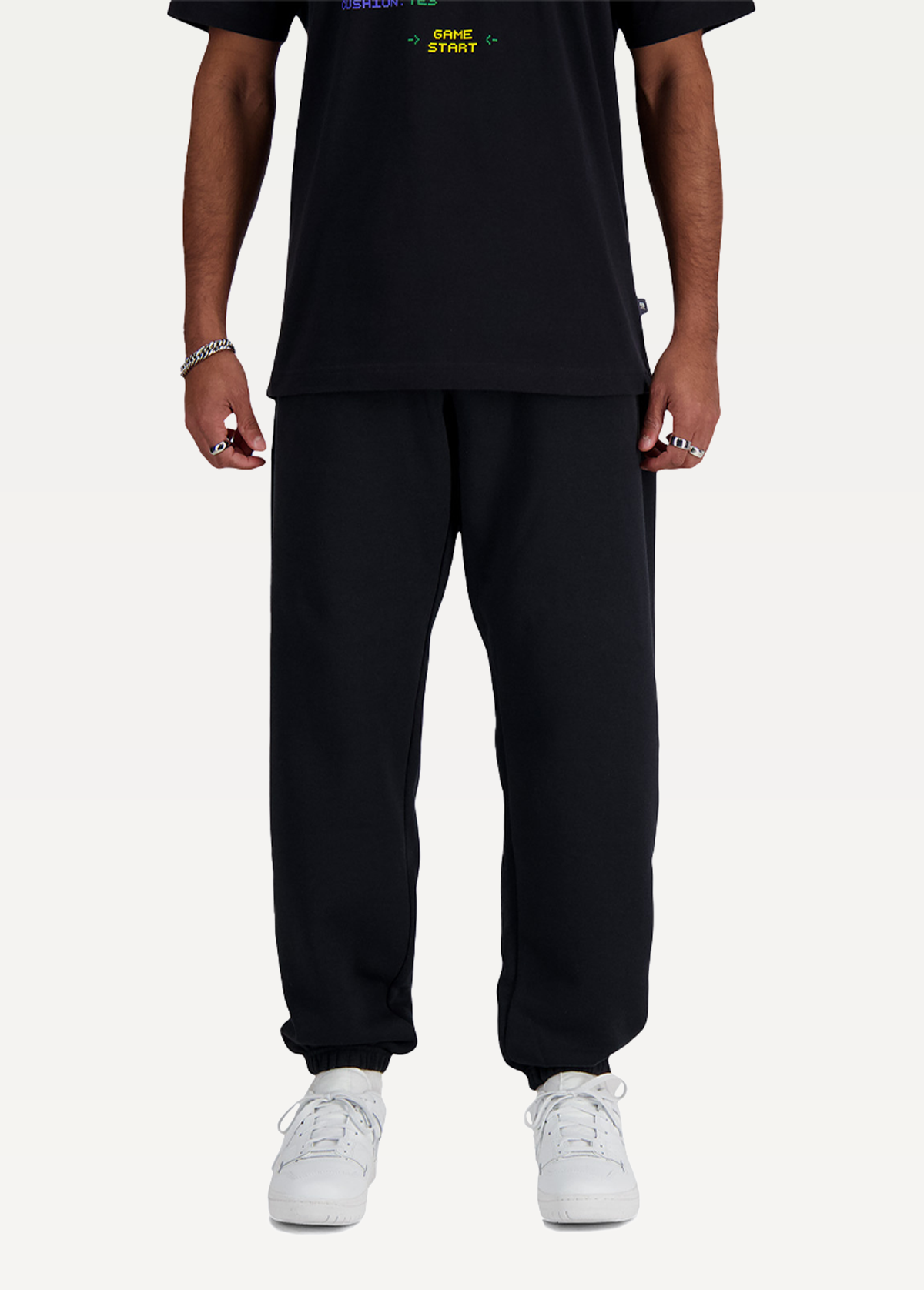 Штаны спортивные мужские New Balance Sport Essentials Fleece черного цвета