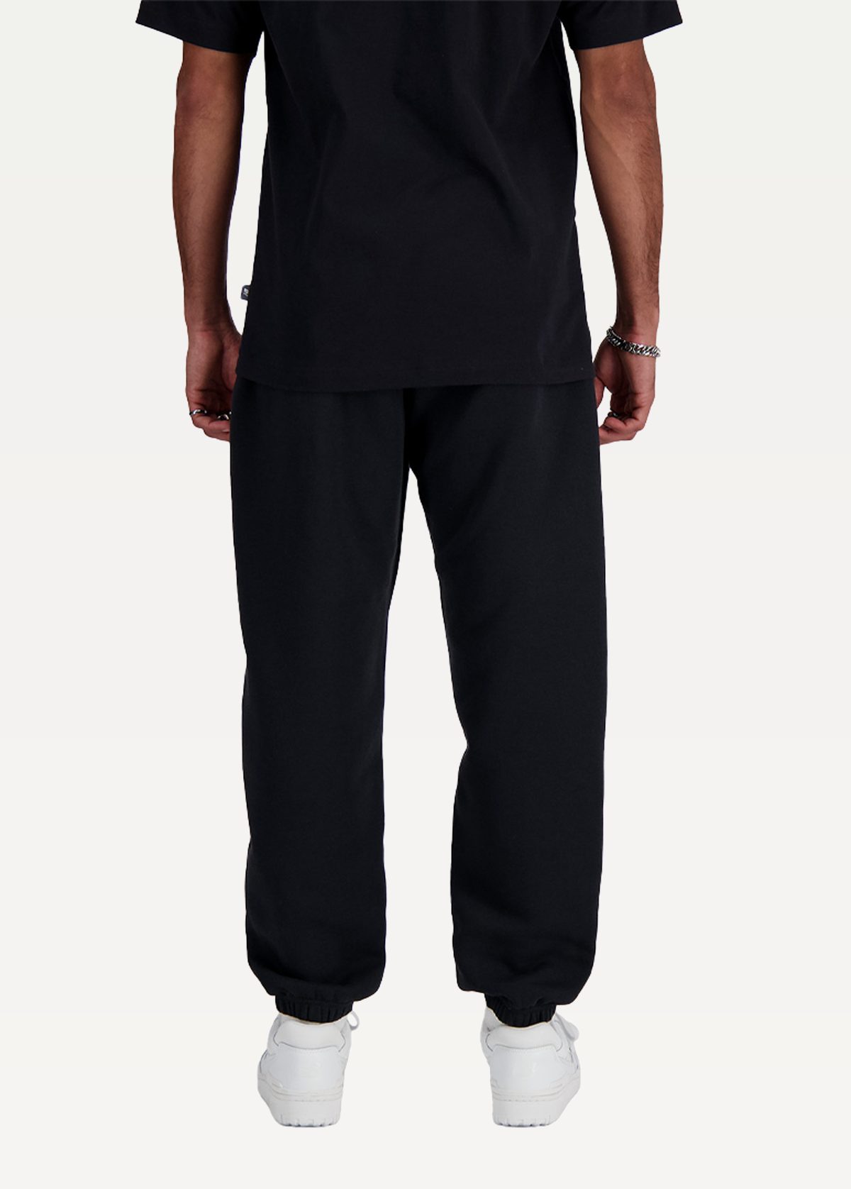 Штаны спортивные мужские New Balance Sport Essentials Fleece черного цвета