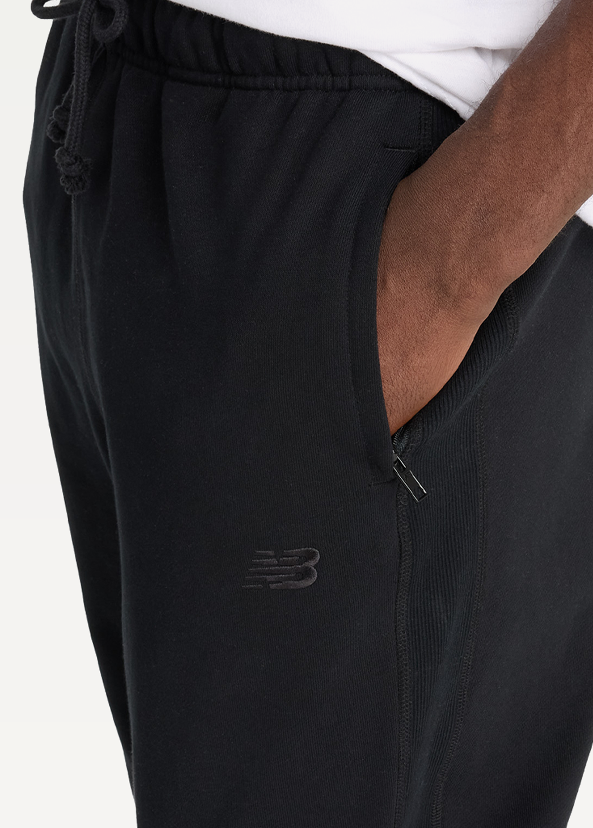 Штани спортивні чоловічі New Balance NB Athletics чорного кольору