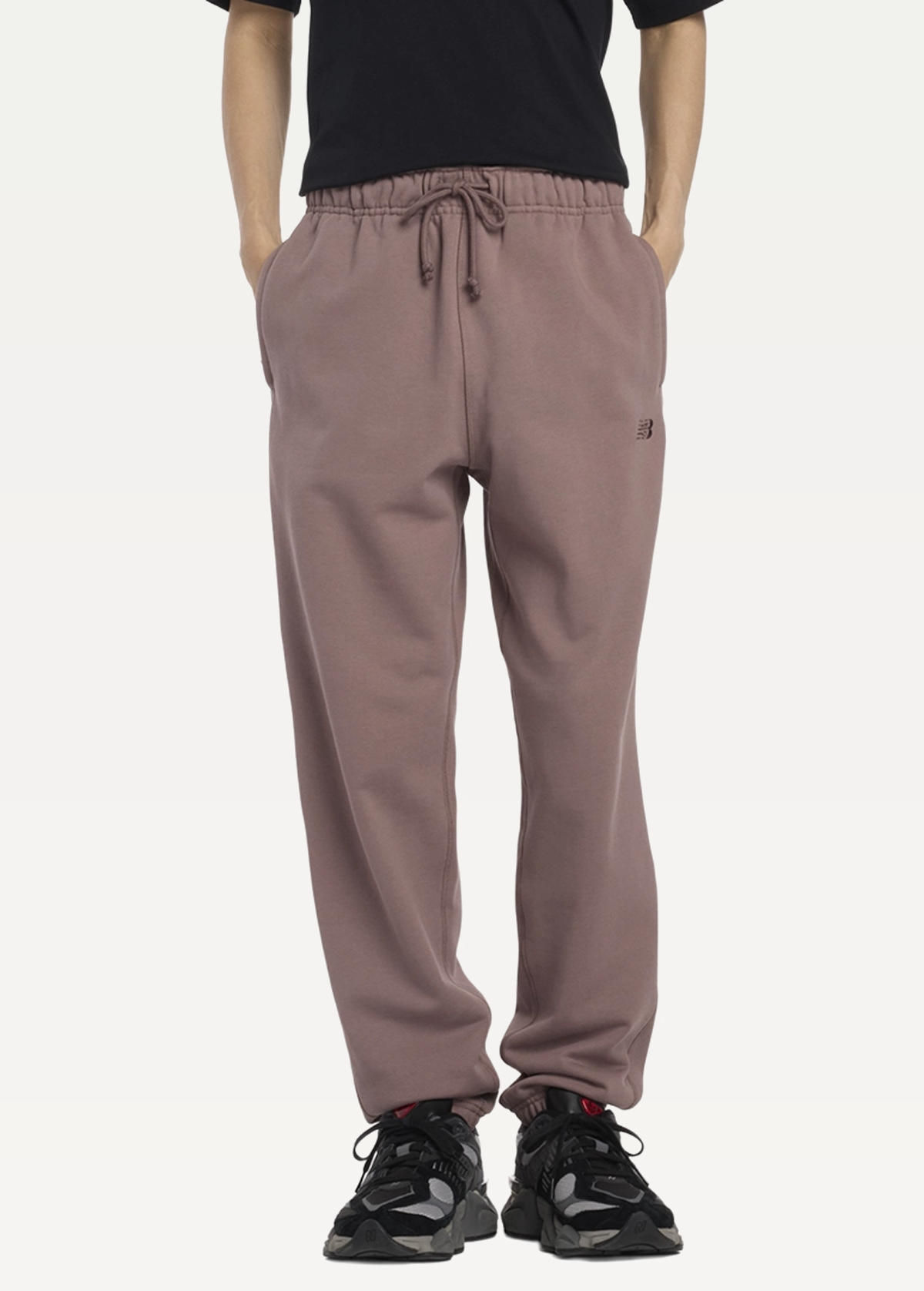 Штани чоловічі New Balance Athletics коричневого кольору