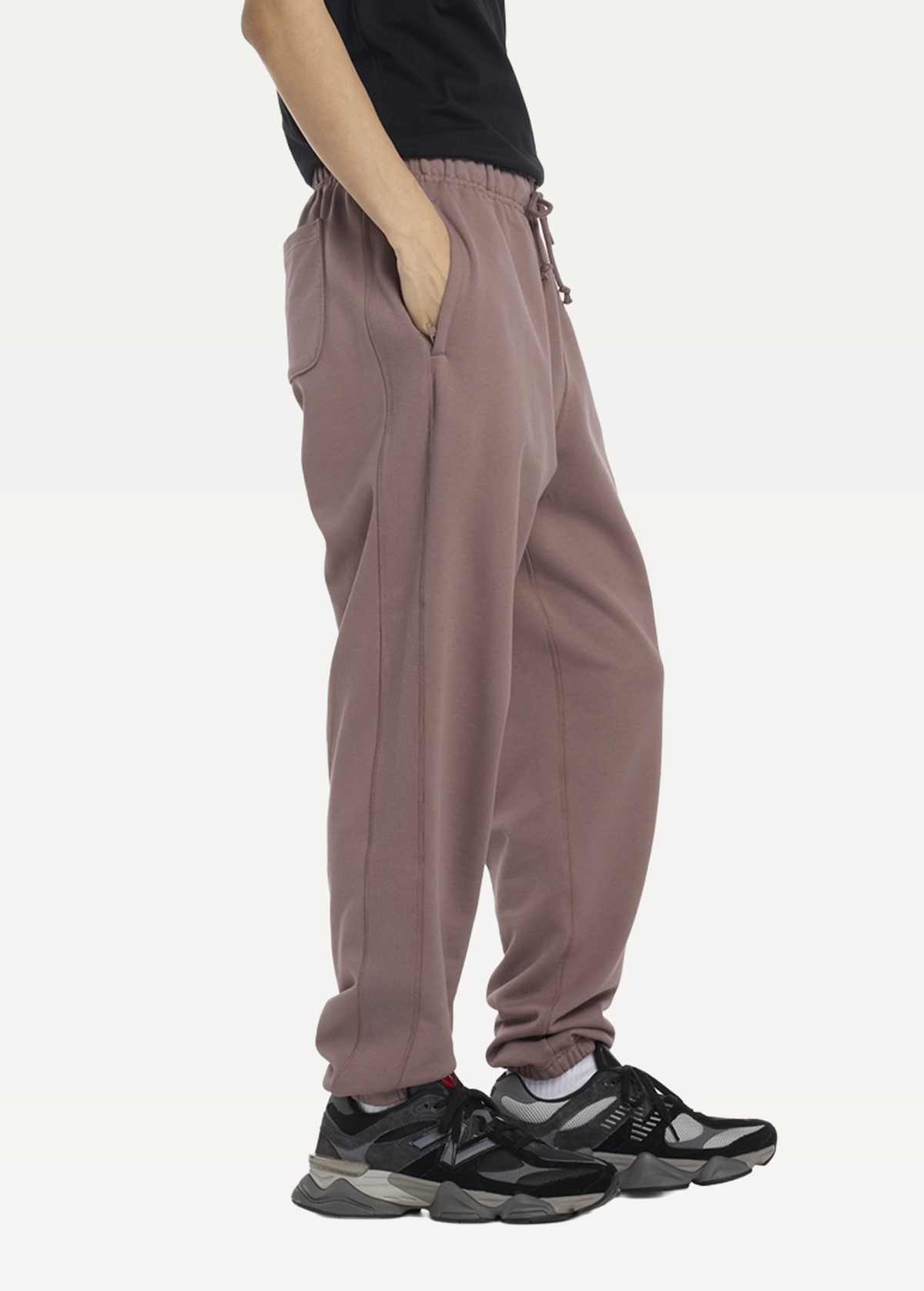 Штани чоловічі New Balance Athletics коричневого кольору