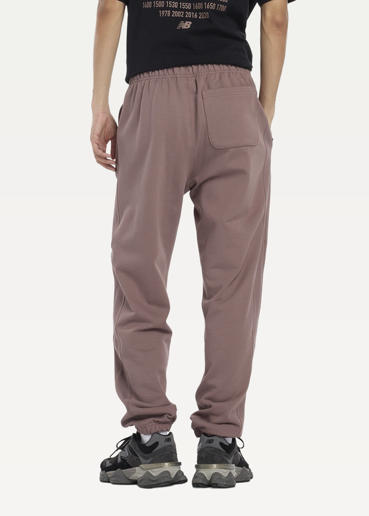 Штани чоловічі New Balance Athletics коричневого кольору