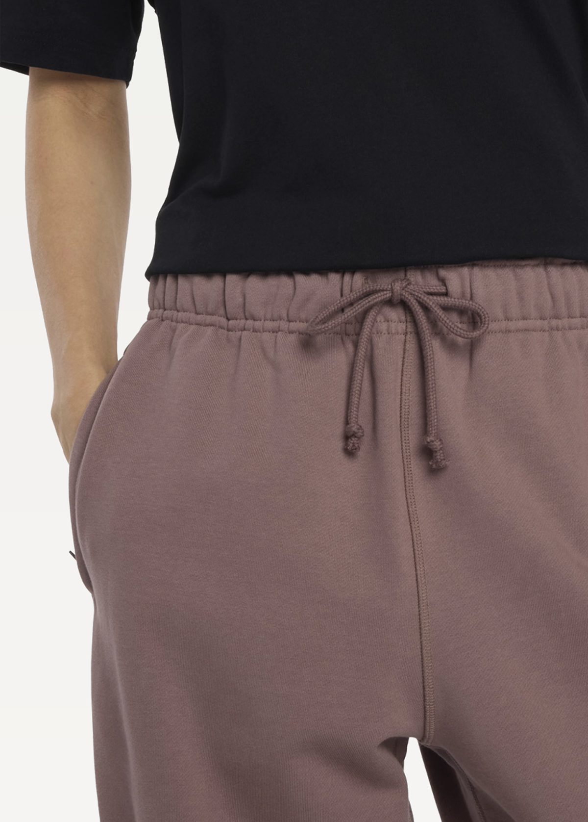 Штани чоловічі New Balance Athletics коричневого кольору