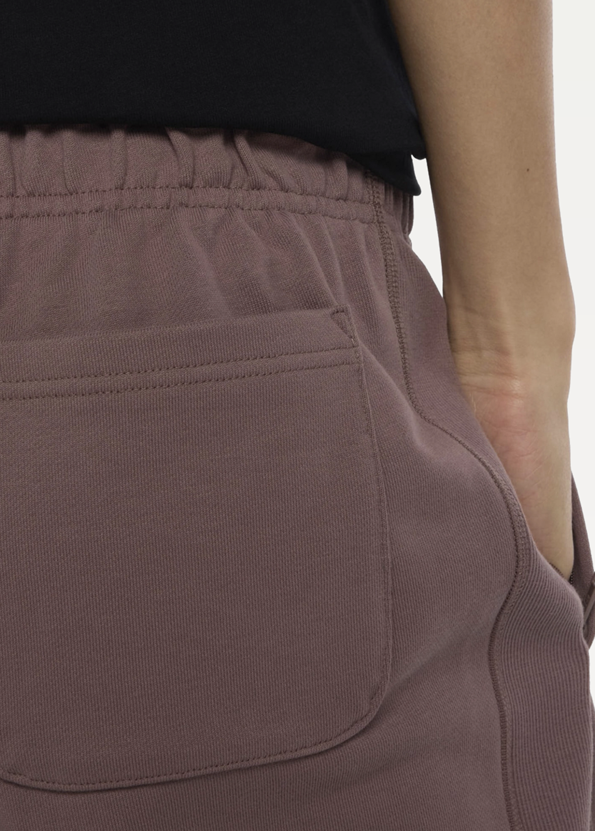 Штани чоловічі New Balance Athletics коричневого кольору