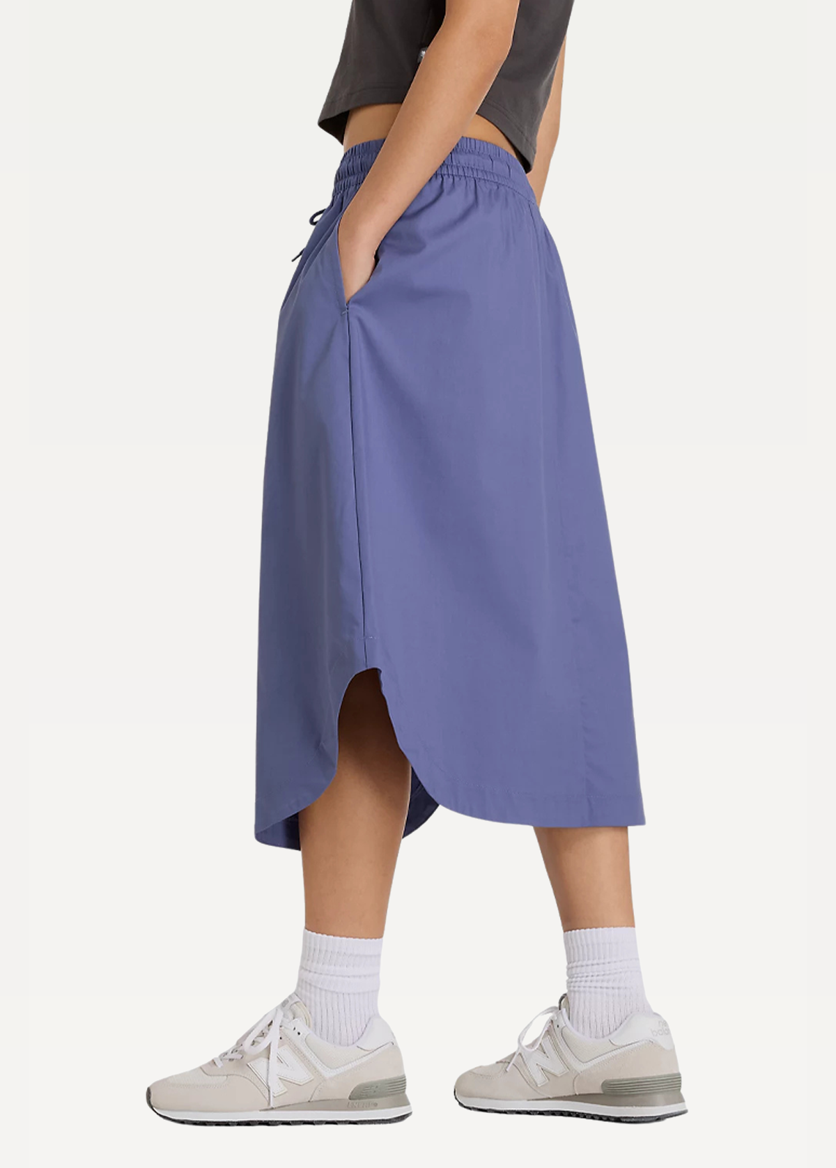 Женская юбка New Balance will Midi темно-синего цвета