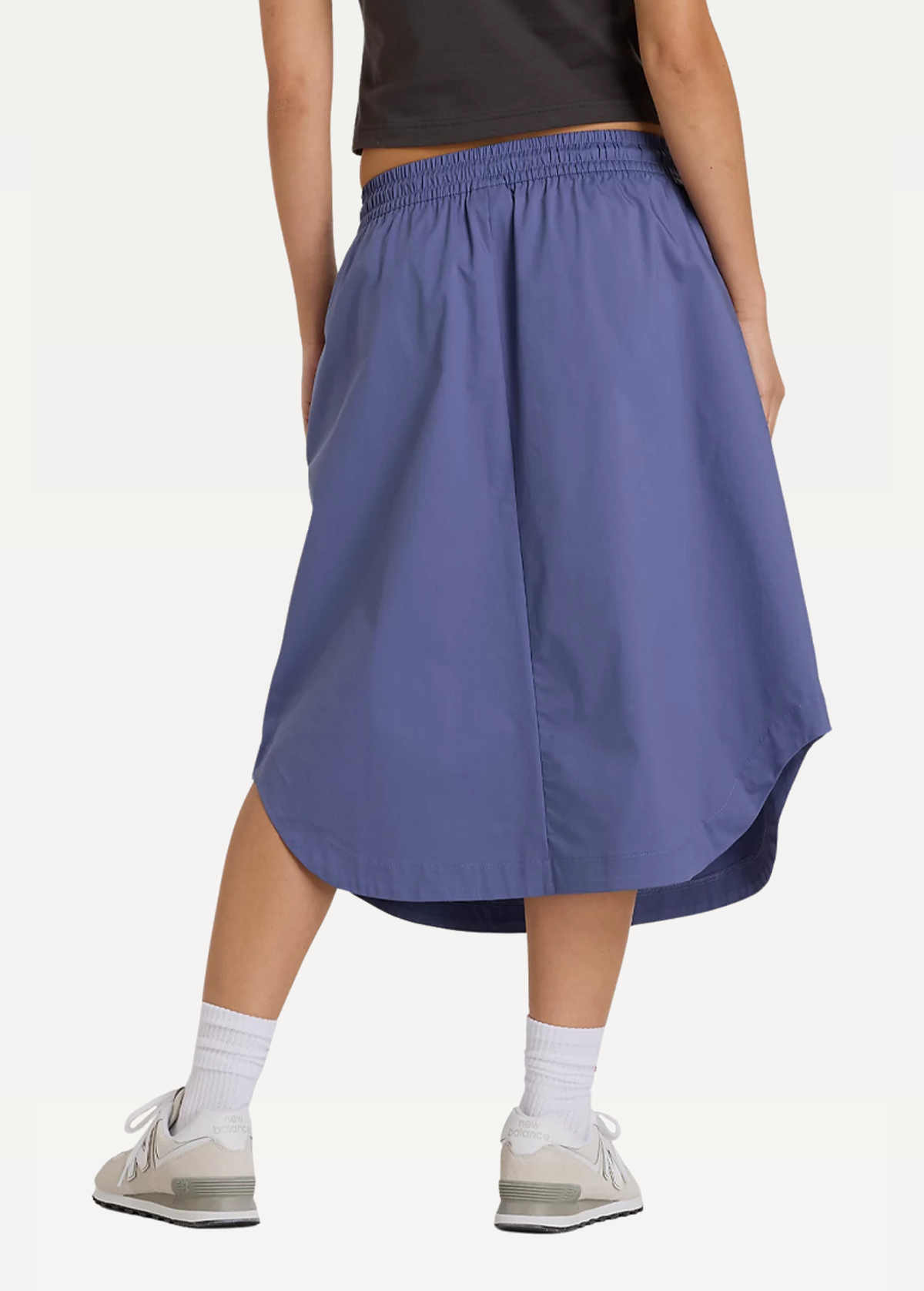 Женская юбка New Balance will Midi темно-синего цвета