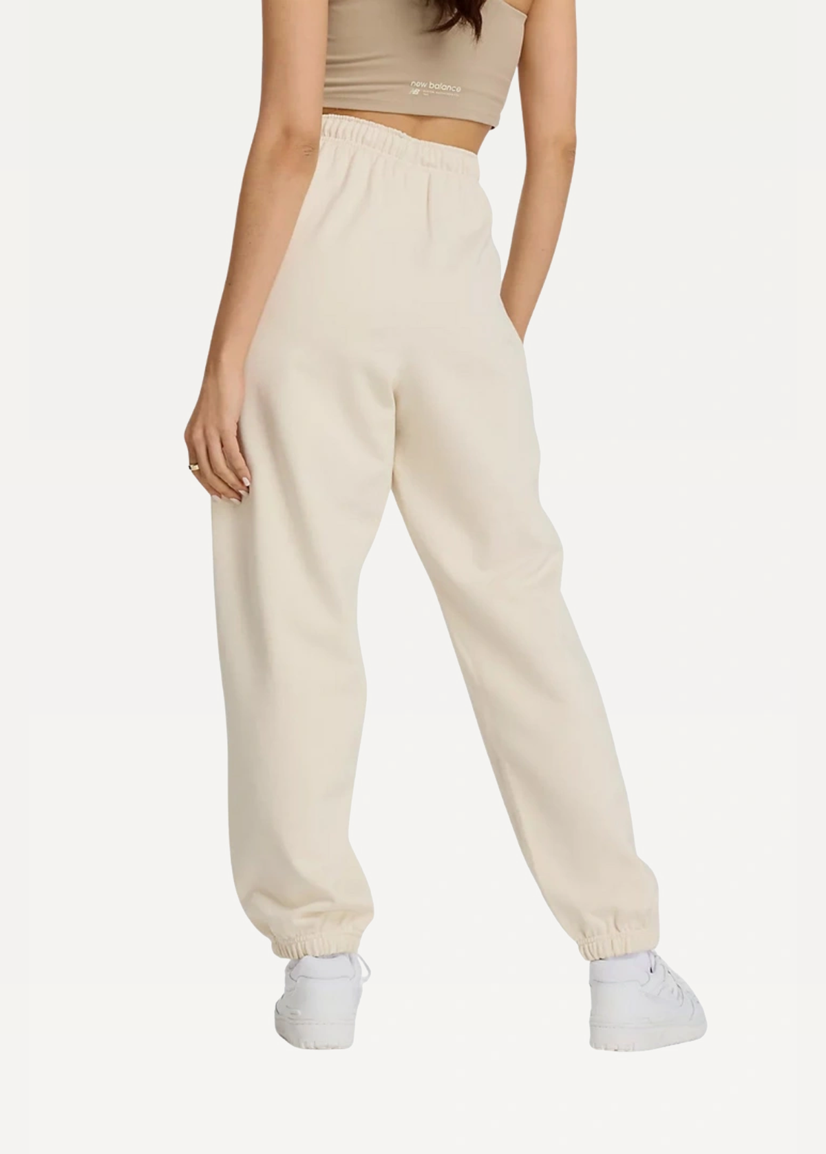 Штани жіночі New Balance NB Athletics молочного кольору