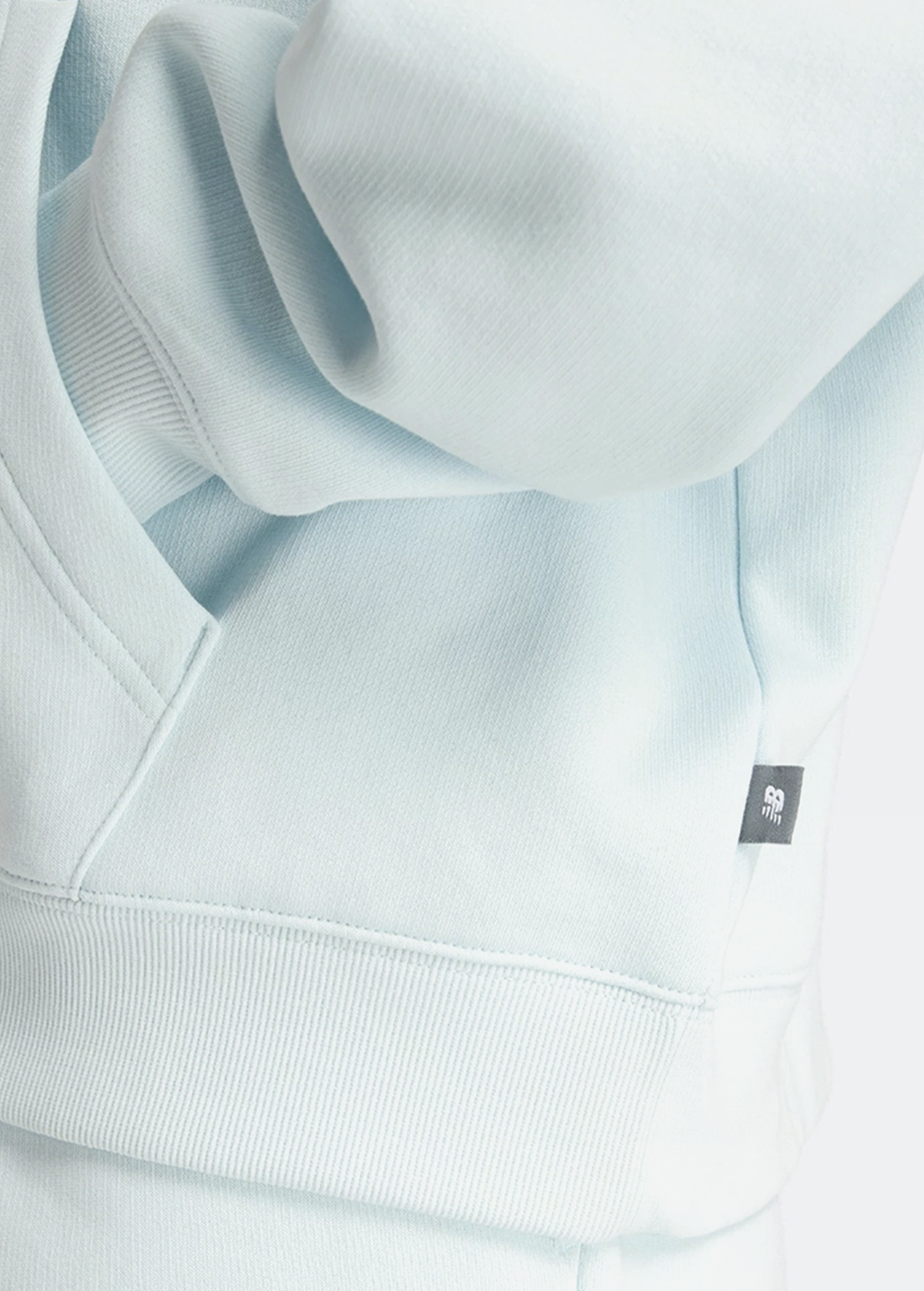 Худі жіноче New Balance Reimagined блакитного кольору