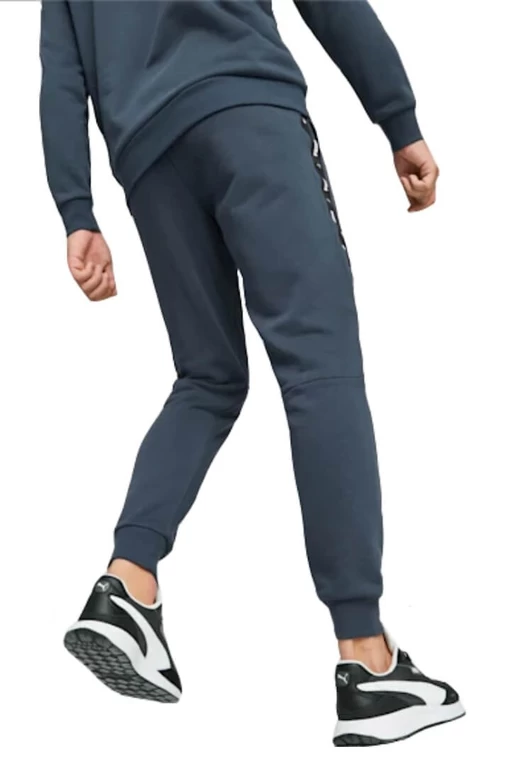 Спортивні штани чоловічі Puma ESS+ Tape Sweatpants синього кольору