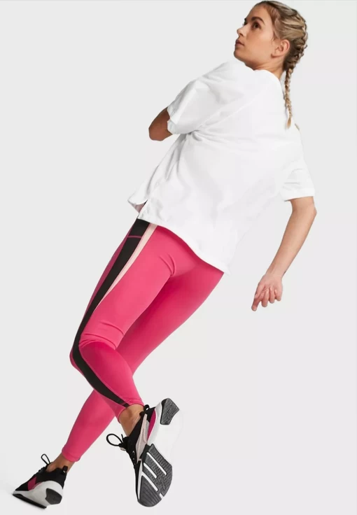 Легінси жіночі Puma EVOSTRIPE High-Waist Tights малинового з чорним кольором