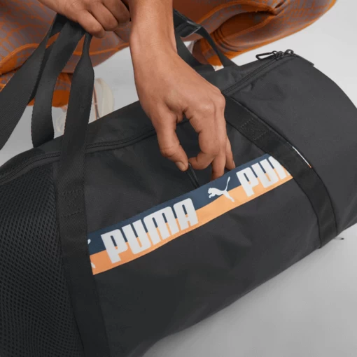 Сумка жіноча Puma AT ESS Barrel Bag чорного кольору 07962901