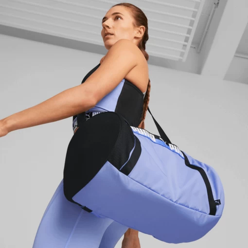 Сумка жіноча Puma AT ESS Barrel Bag лілового кольору