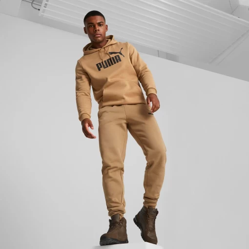 Спортивные брюки мужские Puma ESS Logo Pants песочного цвета