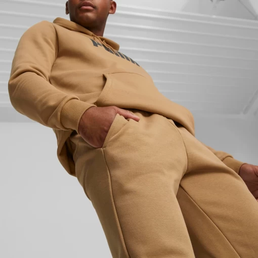 Спортивные брюки мужские Puma ESS Logo Pants песочного цвета