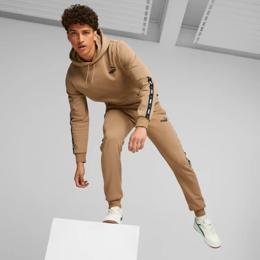 Спортивні штани чоловічі Puma ESS+ Tape Sweatpants пісочного кольору