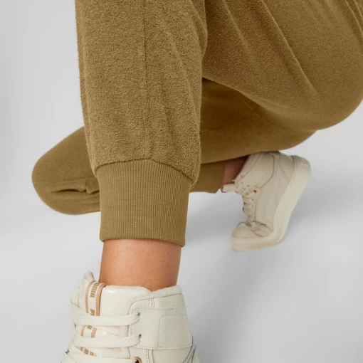Спортивные брюки женские Puma Her Winterized Pants светло-коричневого цвета