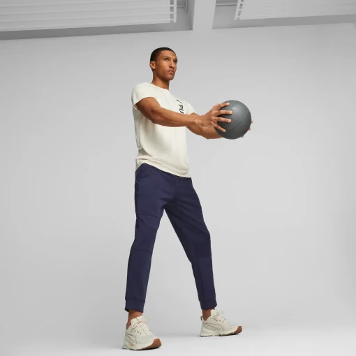 Футболка чоловіча Puma Fit Poly Logo Tee біло-молочного кольору