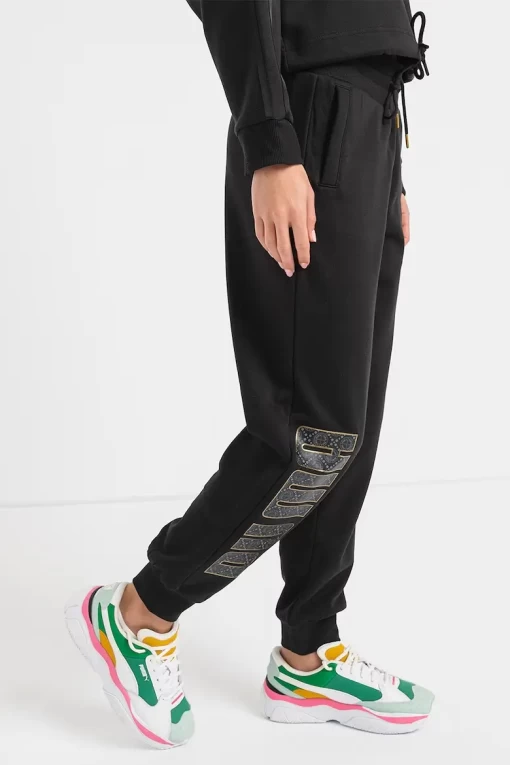 Спортивные брюки женские Puma Power Logolove Pants FL черного цвета