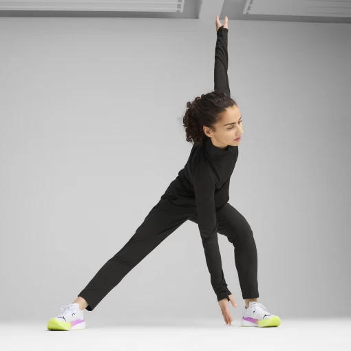 Спортивні штани жіночі PUMA RUN VELOCITY TAPERED PANT W чорного кольору